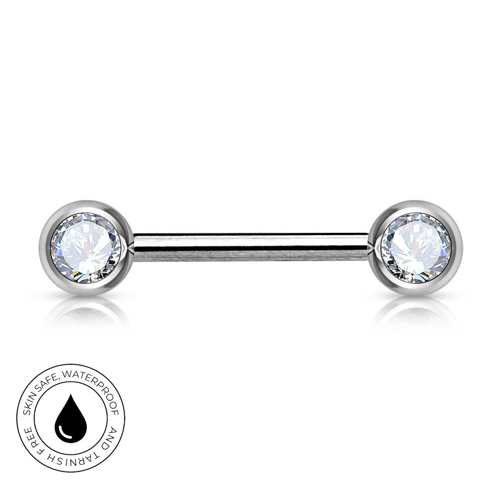 A silver-toned labret piercing barbell with two round bezel-set clear gemstones, shown on a white background with a circular 'skin-safe waterproof' badge in the lower-left corner.