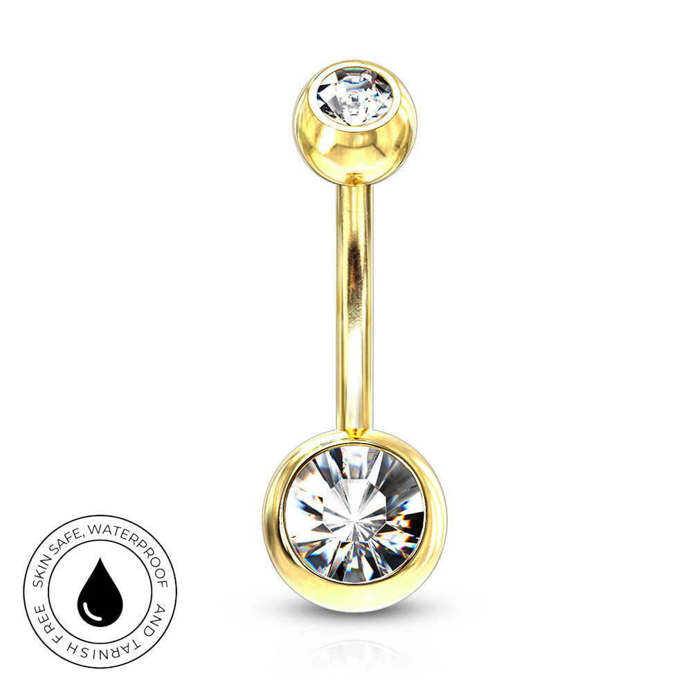 Gold-plated curved barbell navel jewelry with a large clear faceted gemstone on the bottom and a smaller clear gemstone on the top, shown on a white background with a circular 'Skin Safe Waterproof' badge in the lower left.