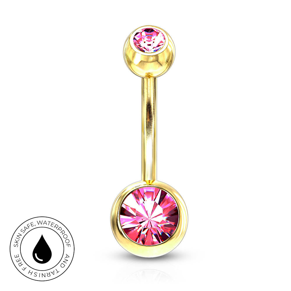 Gold-plated curved barbell navel jewelry with a pink faceted crystal on each end, shown on a white background with a circular 'Skin Safe Waterproof' badge in the bottom-left corner.