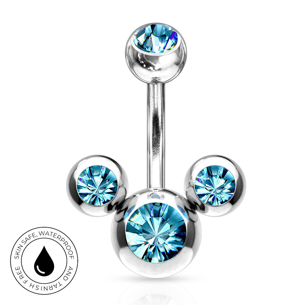 Silver-toned curved barbell navel jewelry with three ball ends, each set with a faceted light blue gemstone, shown on a white background with a small circular 'skin-safe waterproof' badge in the lower left.