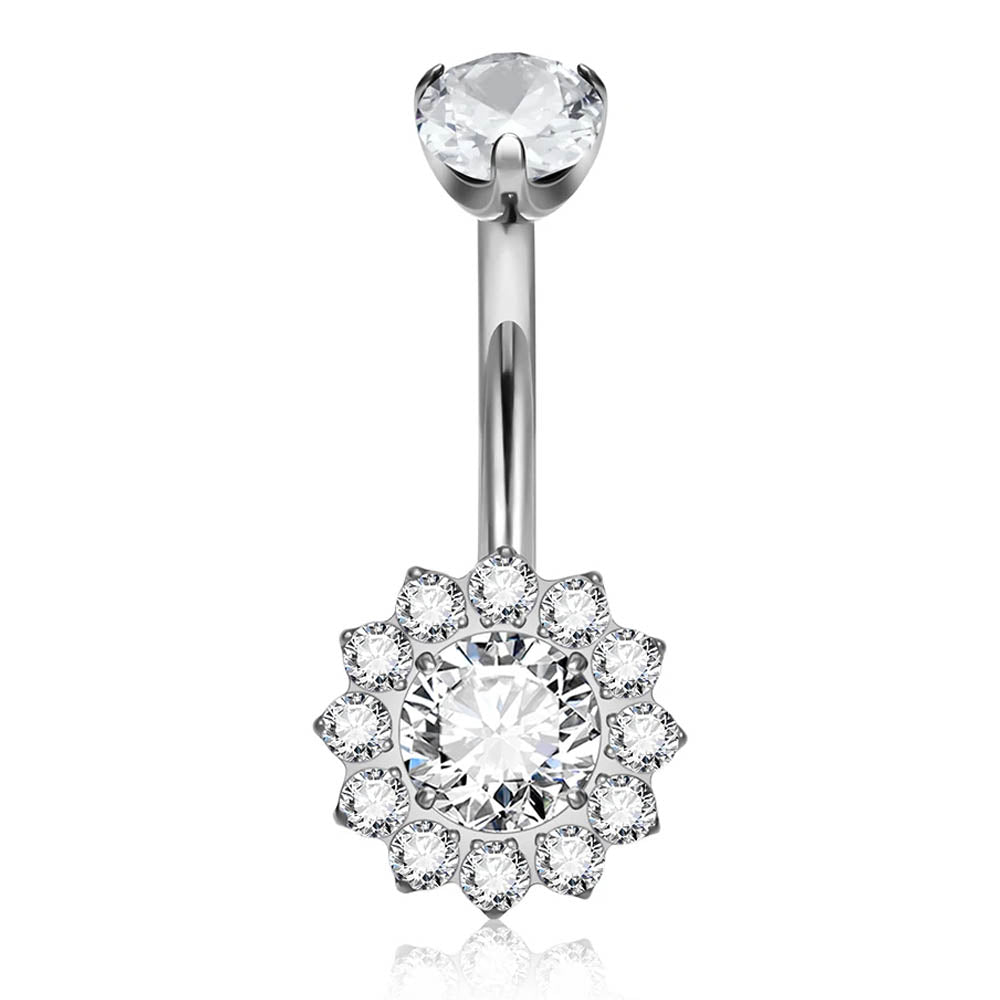 A silver-toned navel ring featuring a single round clear gemstone at the top and a flower-shaped halo cluster with multiple clear stones at the bottom, shown on a white background.