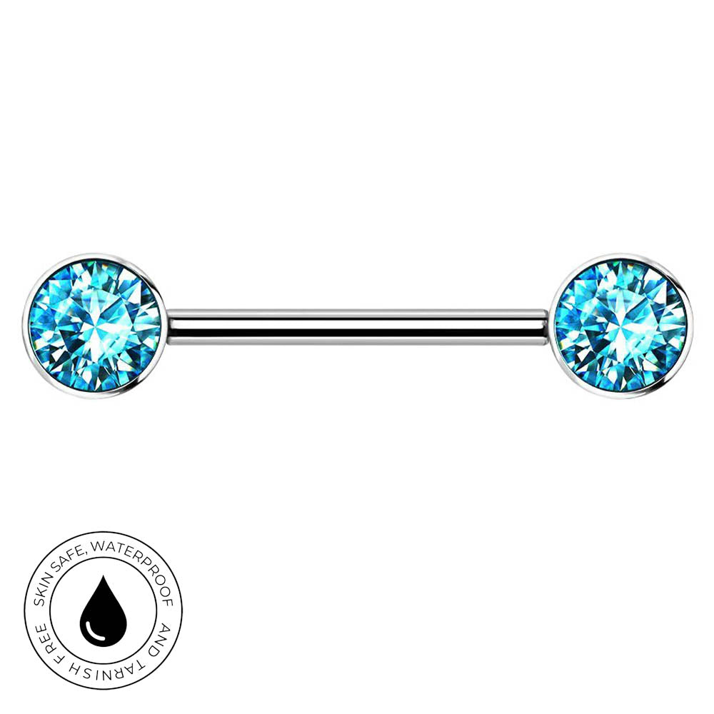 A silver-toned barbell piercing jewelry piece with two round bezel-set light blue gemstones, shown on a plain white background with a circular 'skin-safe waterproof' badge in the lower-left corner.