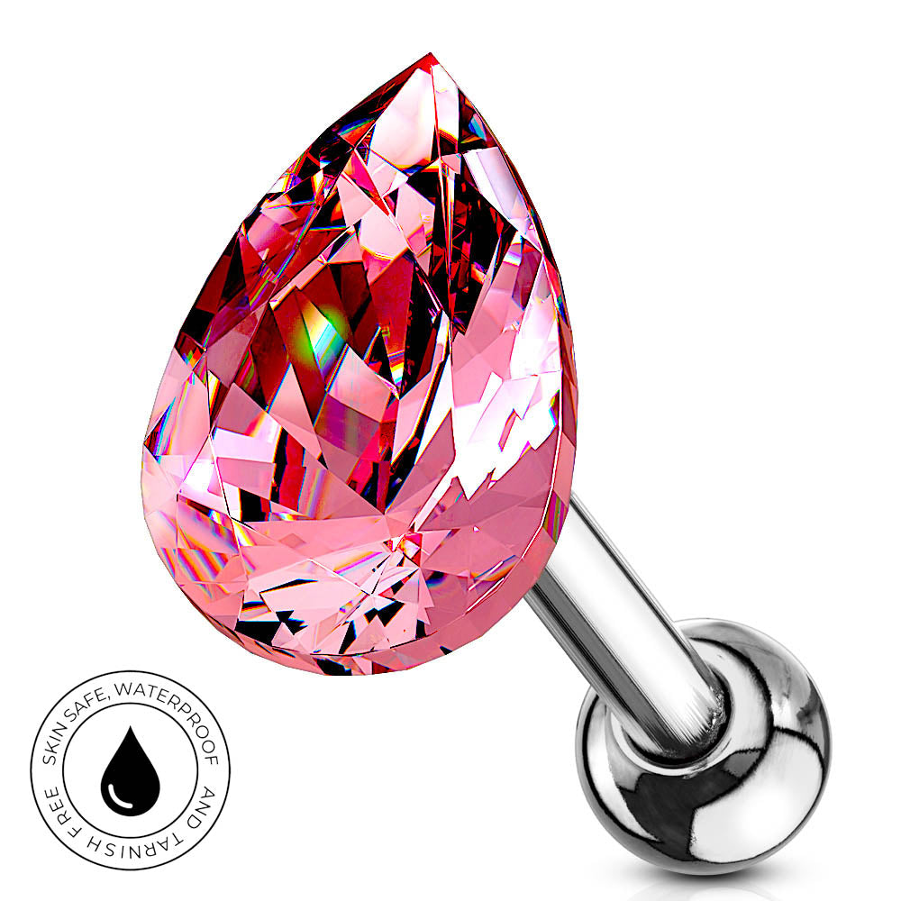 A pink faceted teardrop-shaped labret piercing stud with a polished silver metal post and ball, shown on a white background with a circular 'Skin Safe Waterproof' badge in the lower left.