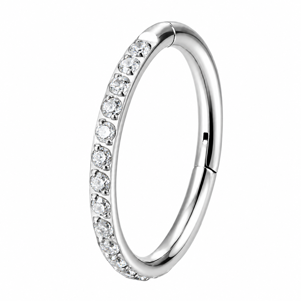 A silver-toned curved ring with a row of clear round-cut stones along the front, shown on a plain white background.