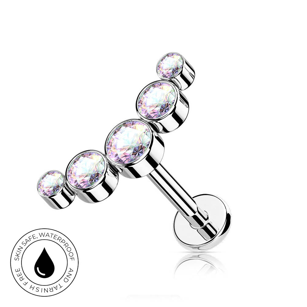 A silver-toned barbell piercing stud with four iridescent, faceted gemstones in different sizes, shown on a white background with a circular 'Skin Safe Waterproof' badge in the lower-left corner.