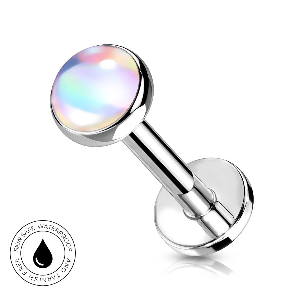A round barbell piercing stud with a polished silver-tone metal post and a domed, iridescent shell-like top that shifts between pastel colors. A small circular badge in the lower-left corner reads 'SKINSAFE WATERPROOF' with a water droplet icon.