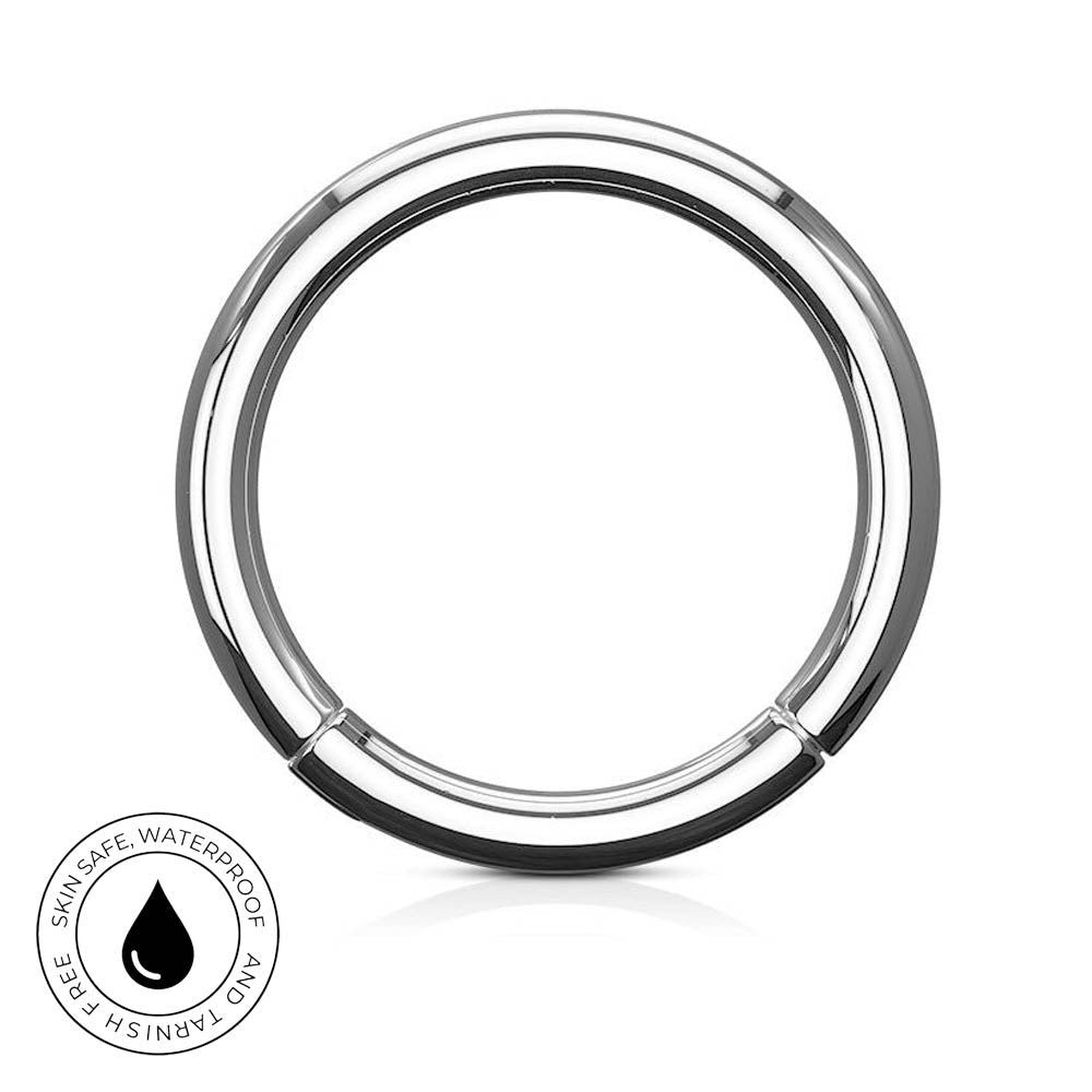 A polished stainless steel circular ring with a black inner lining, shown on a white background with a small circular 'SkinSafe Waterproof' badge in the lower-left corner.
