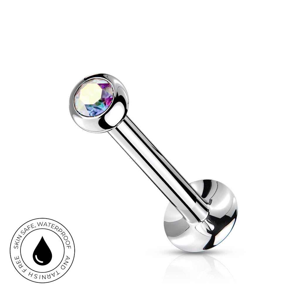 A silver-toned curved barbell piercing stud with a round iridescent crystal ball on one end and a polished ball back, shown on a white background with a small circular 'skin-safe waterproof' badge in the lower left.