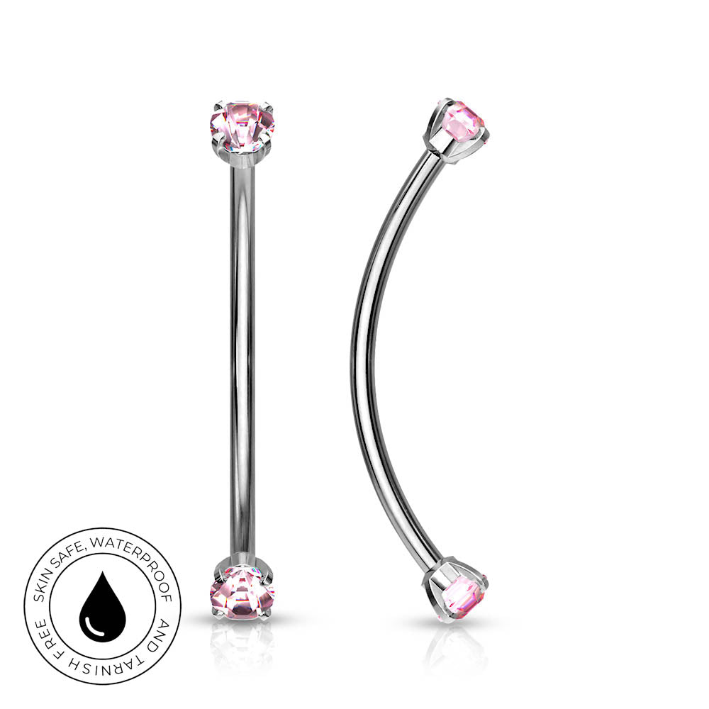 Two silver-toned body jewelry pieces with pink gemstones, shown on a white background. One is straight and one is curved, both featuring prong-set pink stones at the ends.