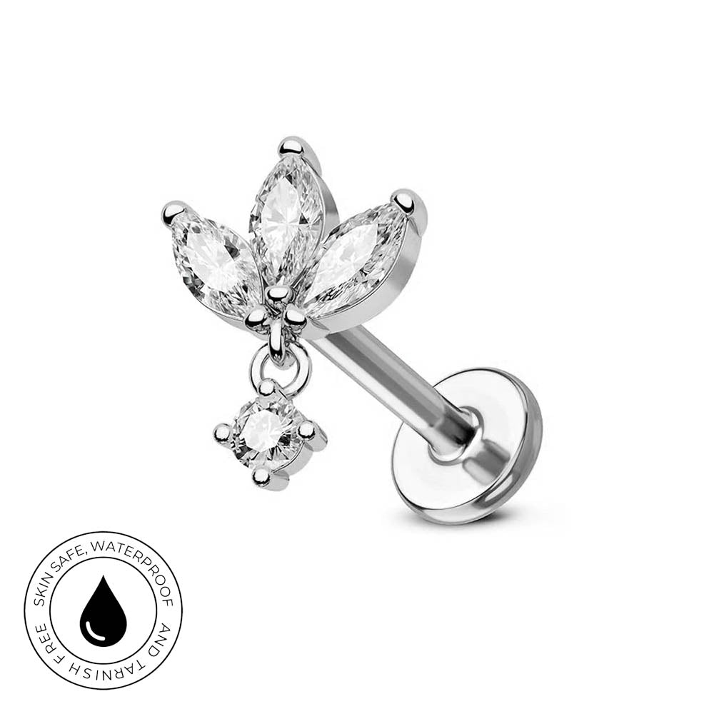 A silver flower-shaped labret piercing stud with marquise-cut clear gemstones and a small dangling round clear gemstone, shown on a white background with a circular 'Skin Safe Waterproof' badge in the lower left.