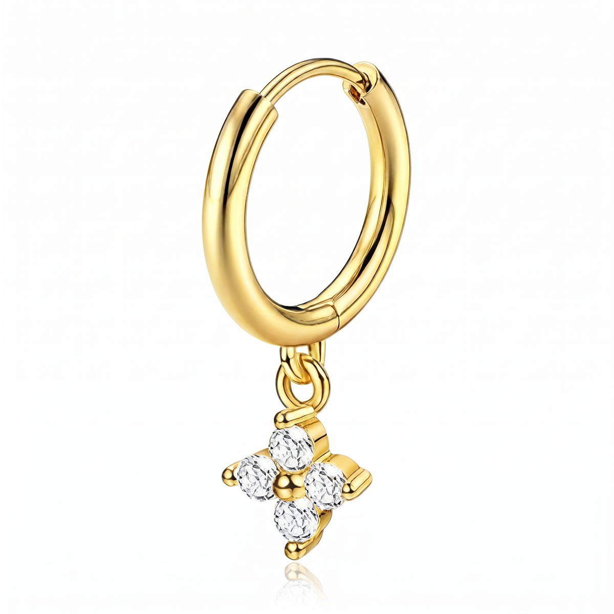 A gold hoop earring with a dangling flower charm set with clear gemstones, shown on a clean white background with a subtle reflection.