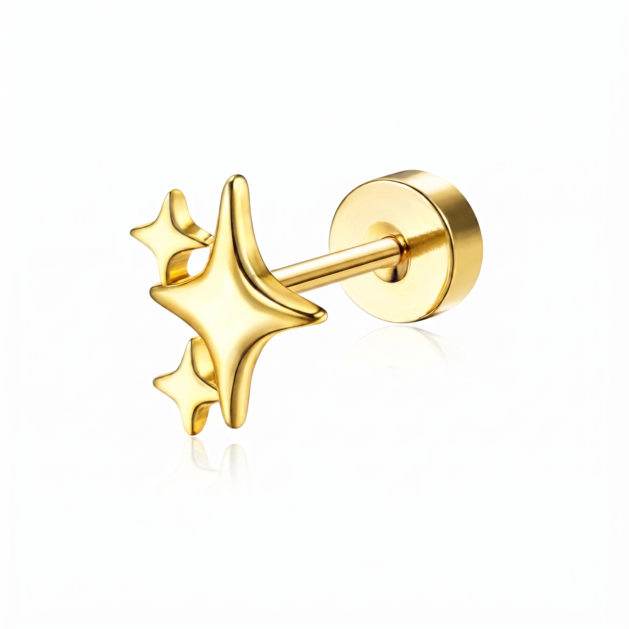 A gold-colored star stud earring with three dimensional star shapes and a round post, shown on a clean white background with a soft reflection.