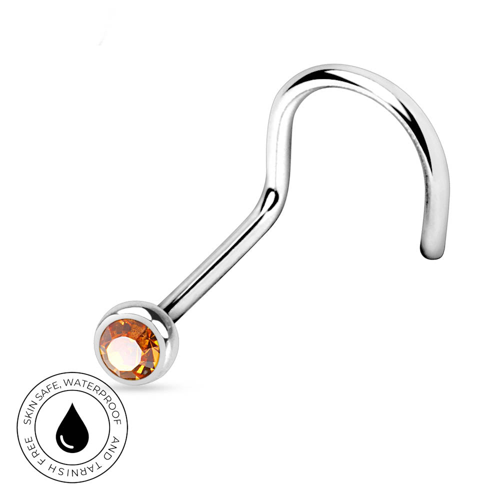 A curved silver-toned labret piercing barbell with a round faceted amber-orange crystal gemstone, shown on a plain white background with a small circular 'skin-safe waterproof and tarushi free' badge in the lower-left corner.