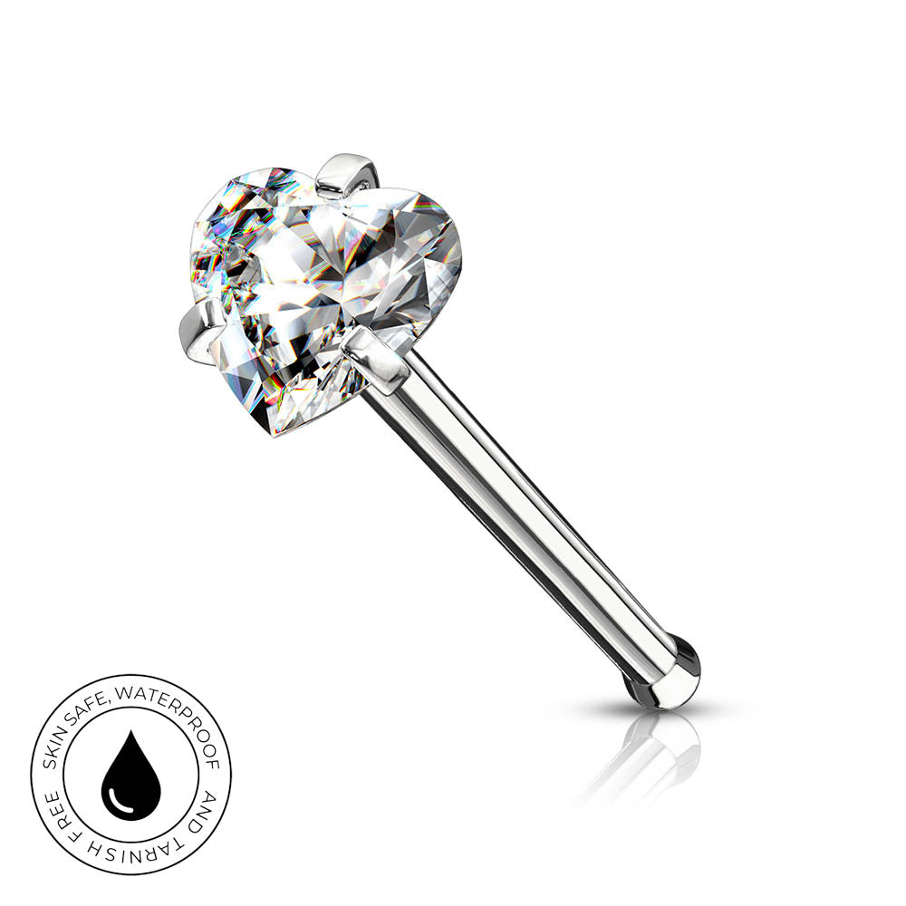 A silver-toned labret piercing barbell with a large, clear heart-shaped gemstone, shown on a white background with a reflection and a circular 'SkinSafe Waterproof' badge in the bottom-left corner.