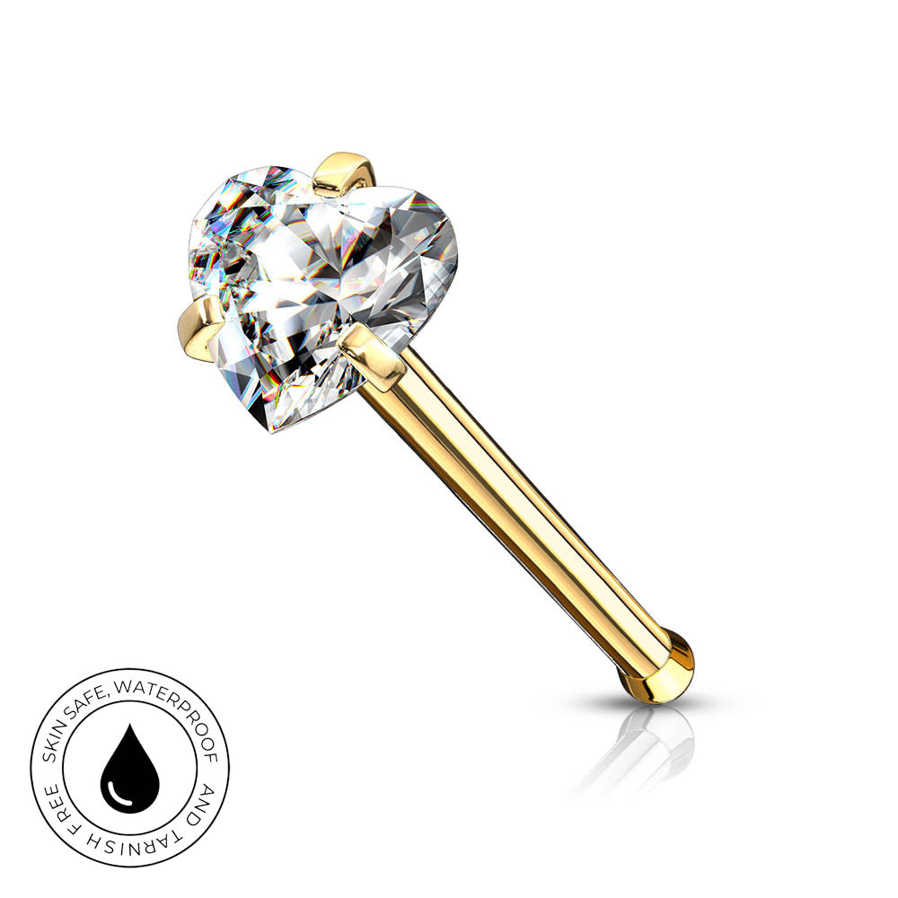 A gold-plated nose ring with a heart-shaped clear gemstone, shown on a white background with a small circular 'SkinSafe Waterproof' badge in the bottom-left corner.