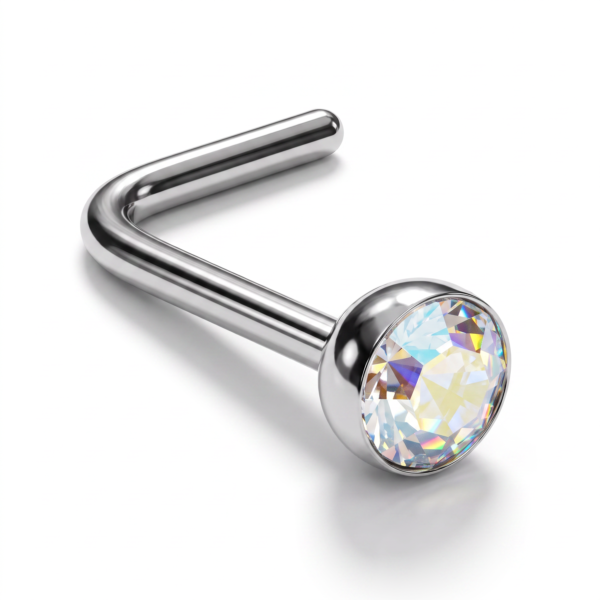 A silver-toned curved barbell nose ring with a faceted, iridescent clear gemstone in a round bezel setting, shown on a clean white background.