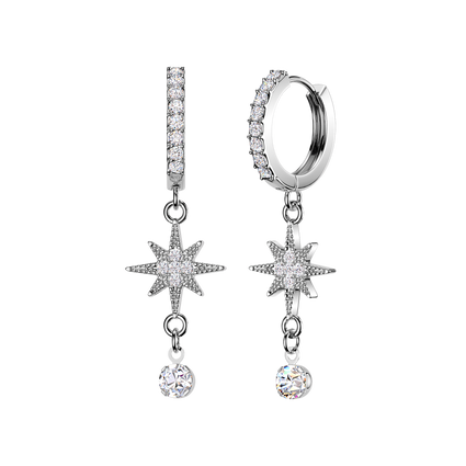 A pair of silver-toned dangle earrings with clear cubic zirconia stones, featuring a vertical bar with a pavé-set top, a starburst charm, and a dangling round stone, shown on a plain white background.