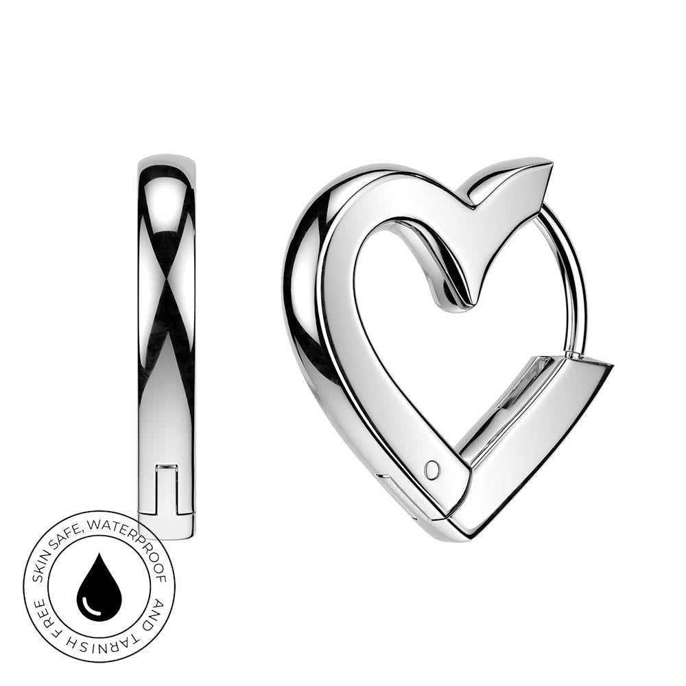 A polished silver huggie hoop earring shaped like a heart outline, shown from both front and side views on a white background, with a circular 'Skin Safe Waterproof' badge in the lower left.