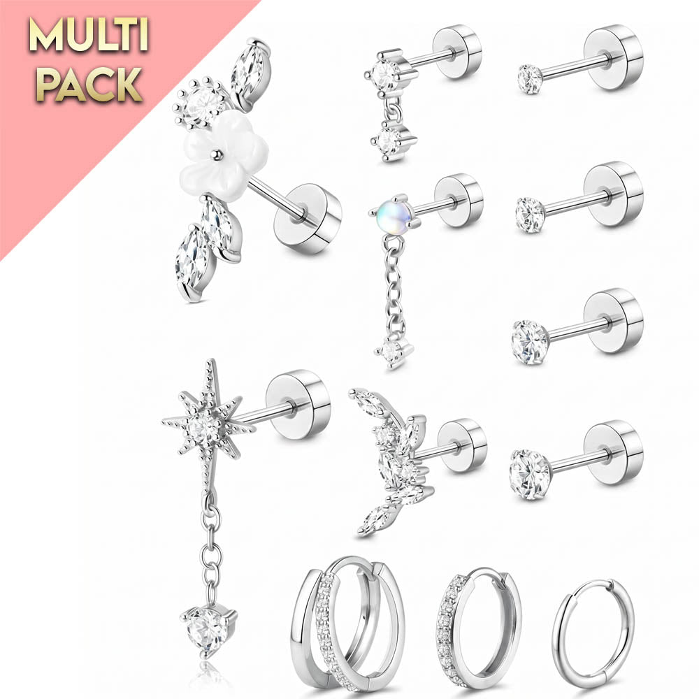 A 12-piece silver stud and hoop jewelry set displayed on a white background with a pink diagonal banner in the top-left corner reading 'MULTI PACK'. The set includes various floral, celestial, and geometric stud earrings as well as three hoop styles, all featuring clear rhinestones and cubic zirconia accents.