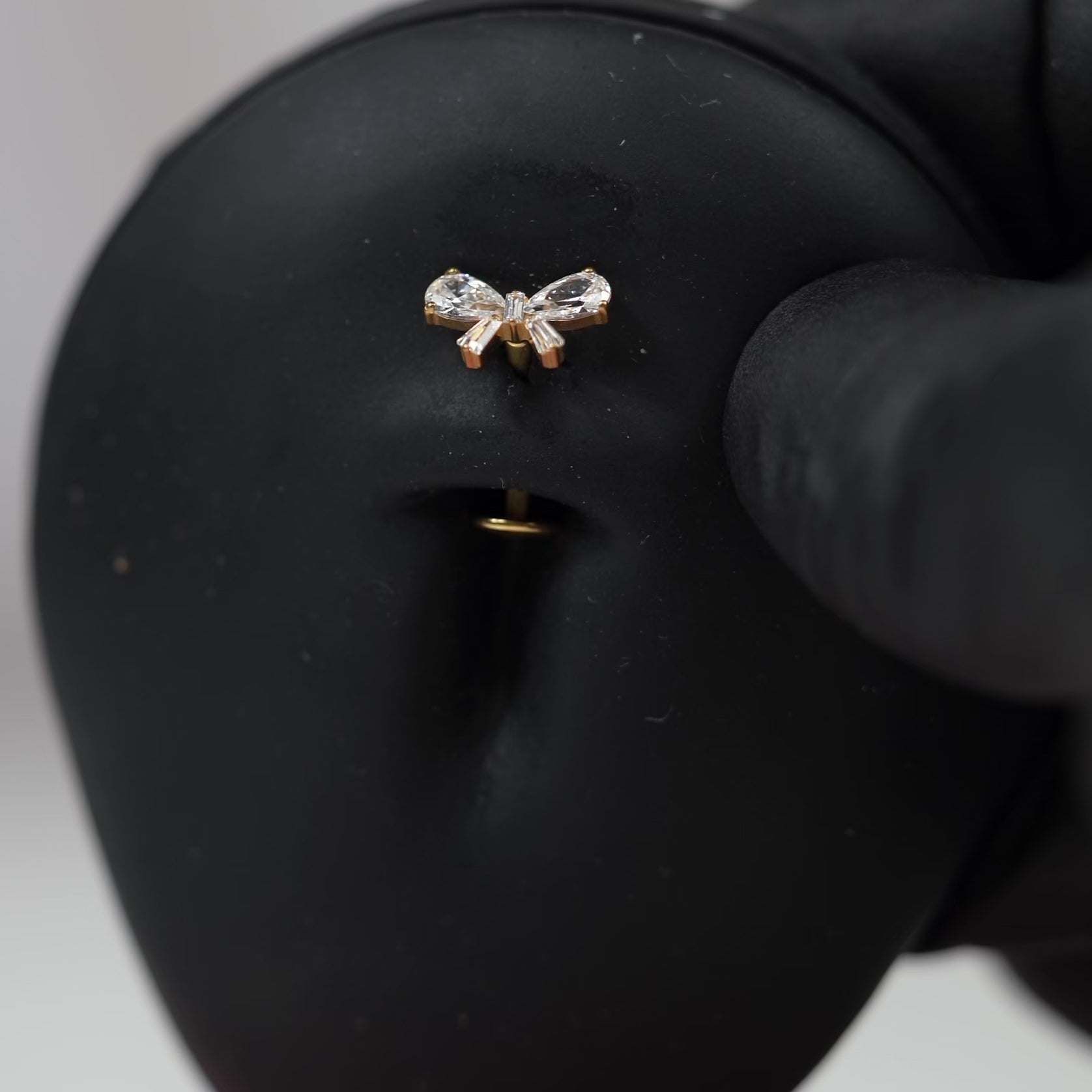 14 Gauge Threadless Titanium Bow Floating Belly Button Bar