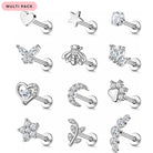 A 12-piece multi-pack of silver-toned navel piercings decorated with clear crystals and charms, including hearts, stars, flowers, a bee, a crescent moon, and a heart with a flower, arranged on a white background with a pink 'MULTI PACK' label in the top left corner.