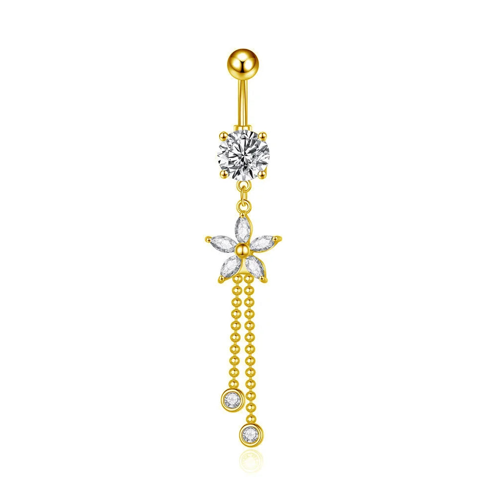 Gold belly button ring with floral design and dangling beads on a white background