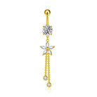 Gold belly button ring with floral design and dangling beads on a white background