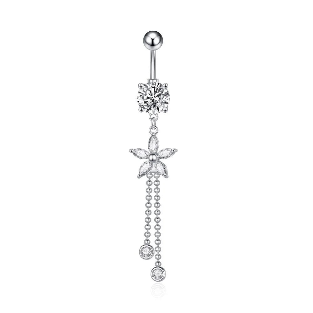 A silver-toned belly button ring featuring a floral stud, a dangling flower charm, and three beaded chains ending with small round clear stones, shown on a plain white background.