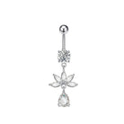 A silver-toned belly button ring featuring a ball barbell, a snowflake-shaped crystal cluster, a flower-shaped crystal charm, and a teardrop crystal drop on a plain white background.