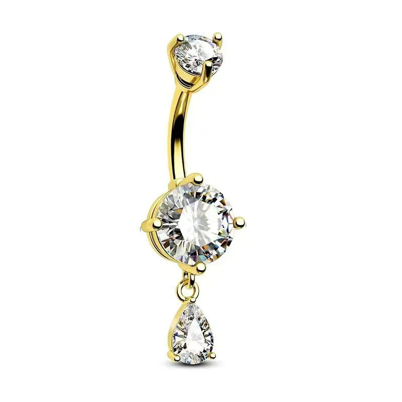 Gold belly button ring with three clear gemstones on a white background