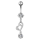 A silver-toned belly button ring featuring a ball end, a round clear gemstone, a dangling open heart design, and a bottom round clear gemstone, shown on a plain white background.