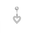 A silver-toned belly button ring featuring a heart-shaped pendant paved with small clear stones, with a round bezel-set clear stone on the barbell, shown against a plain white background.