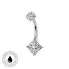 A curved barbell belly button ring with a top round-cut gemstone and a larger square princess-cut gemstone dangling below, shown on a white background with a small 'skin-safe waterproof' badge in the lower left.