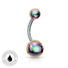 Curved barbell navel piercing jewelry with iridescent rainbow-finish spheres on a white background, featuring a circular skin-safe waterproof badge in the lower-left corner.