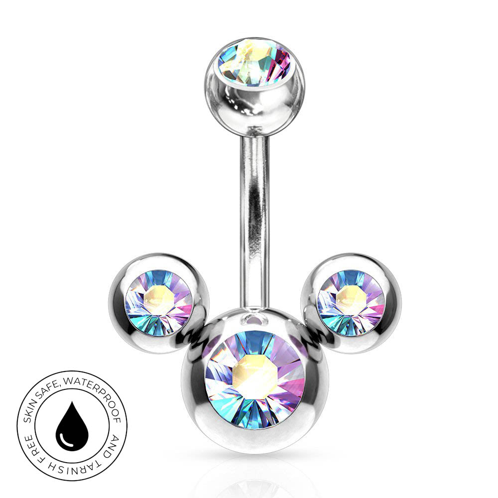 A silver-toned curved barbell belly button ring with three ball end settings, each holding an iridescent rainbow crystal. A circular badge in the lower-left corner reads 'SKINSAFE WATERPROOF' with a droplet icon.