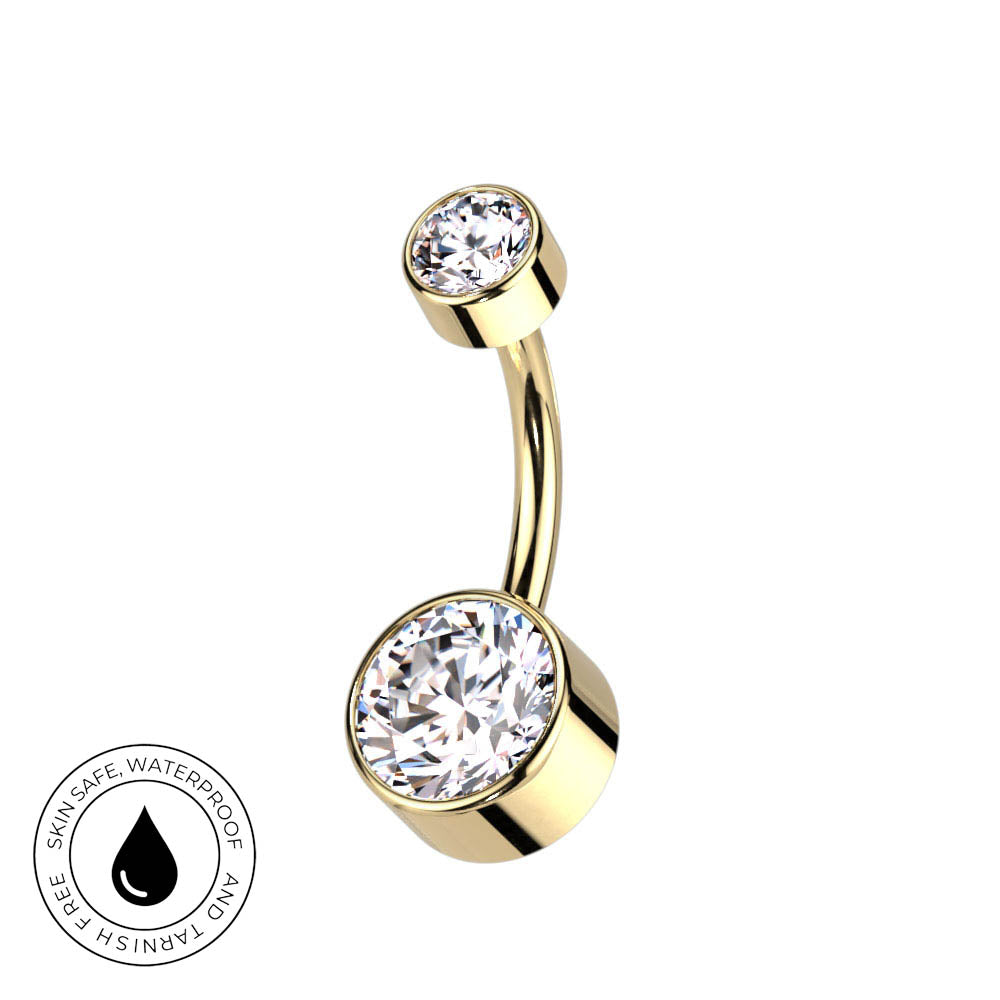Gold-plated curved navel barbell piercing with two round bezel-set clear cubic zirconia stones, shown on a white background with a circular 'Skin Safe Waterproof' badge in the lower-left corner.