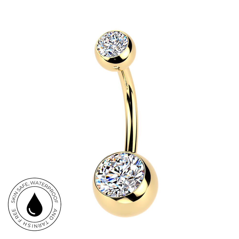 Gold curved barbell navel jewelry with two round bezel-set clear gemstones, shown on a white background with a circular 'Skin Safe Waterproof' badge in the lower left.