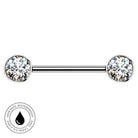 A silver-toned barbell piercing jewelry piece with two round clear gemstones, shown on a plain white background with a circular 'skin-safe waterproof' badge in the lower-left corner.