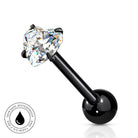 A black barbell piercing stud with a large clear heart-shaped gemstone, shown on a white background with a circular 'Skin Safe Waterproof' badge in the lower-left corner.