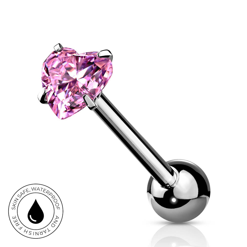 A silver-toned barbell nose ring with a faceted pink heart-shaped gemstone, shown on a white background with a circular 'SkinSafe Waterproof' badge in the lower-left corner.