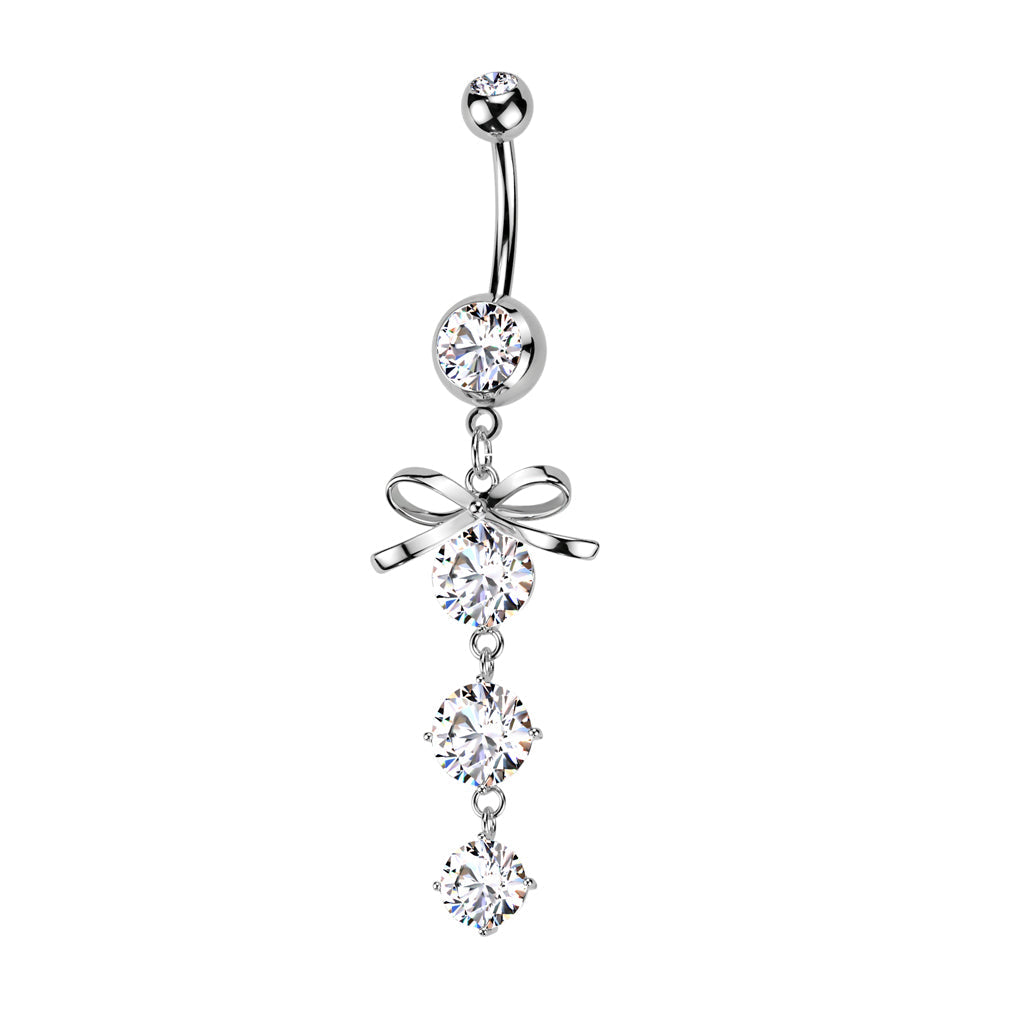 Silver belly button ring with bow and crystal design on a white background