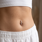 14 Gauge Studded Hinged Belly Button Ring worn by female model
