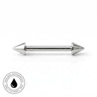 A stainless steel barbell piercing with conical spike ends, shown horizontally on a clean white background with a circular 'Skin Safe, Waterproof' badge in the bottom-left corner.