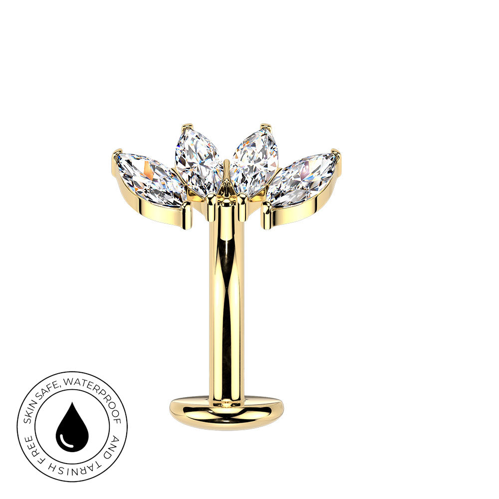 A gold-plated flower-shaped labret piercing stud with marquise-cut clear crystals, shown on a plain white background with a circular 'Skin Safe Waterproof' badge in the bottom-left corner.