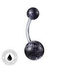 A curved barbell navel piercing jewelry piece with two dark purple marbled gemstone balls on a silver-toned metal bar, shown on a white background with a circular skin-safe waterproof badge in the bottom-left corner.
