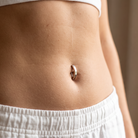 14 Gauge Titanium Hinged Belly Button Clicker Ring worn by model 