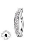 A curved silver-toned hoop ring with a channel of clear cubic zirconia stones on the front, shown on a plain white background with a circular 'skin-safe waterproof' badge in the lower-left corner.