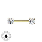 A gold barbell navel piercing with two round-cut clear gemstones, shown on a plain white background with a circular 'Skin Safe Waterproof' badge in the lower-left corner.