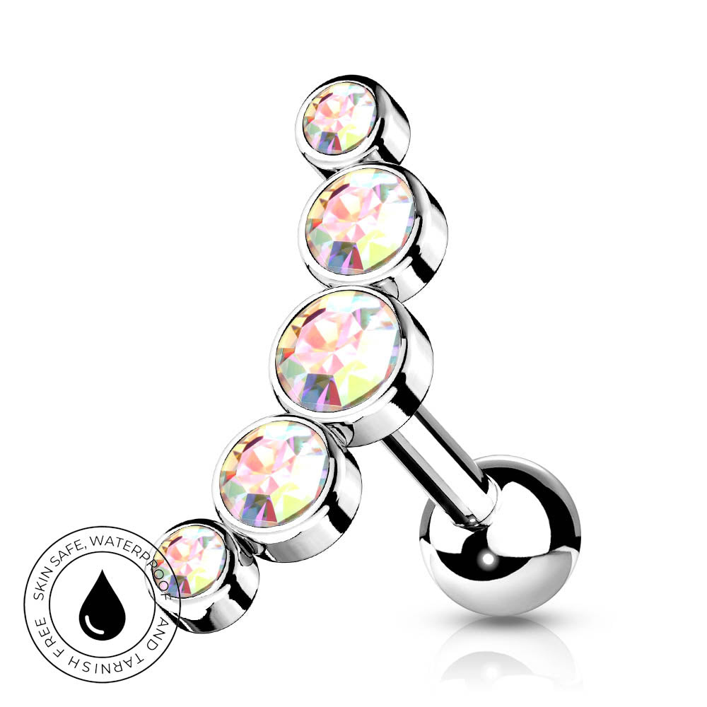A silver-toned barbell-style belly button ring with four stacked round iridescent faceted gemstones, shown on a white background with a small circular skin-safe waterproof badge in the lower left.