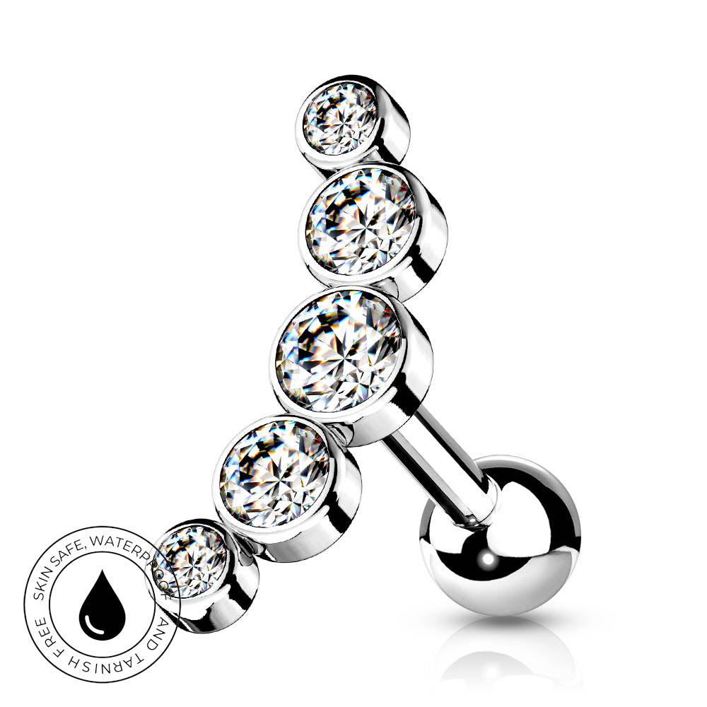 A silver-toned curved barbell belly button piercing with five stacked round bezel-set clear cubic zirconia stones, shown on a white background with a small circular water-resistant badge in the lower left.